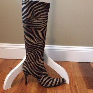 Animal print knee high boots
